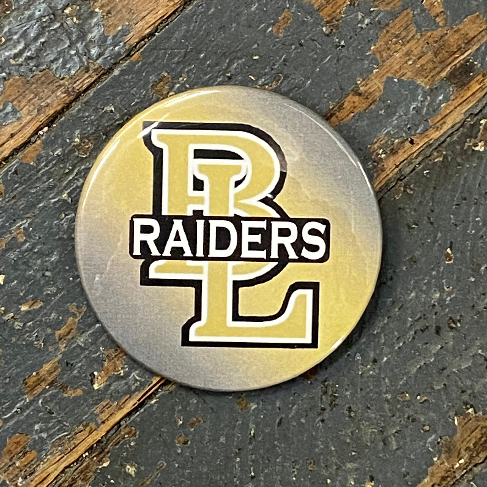 Ben Logan Raiders Button