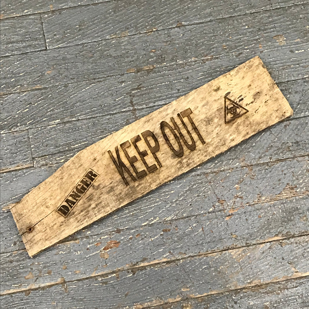wooden keep out sign